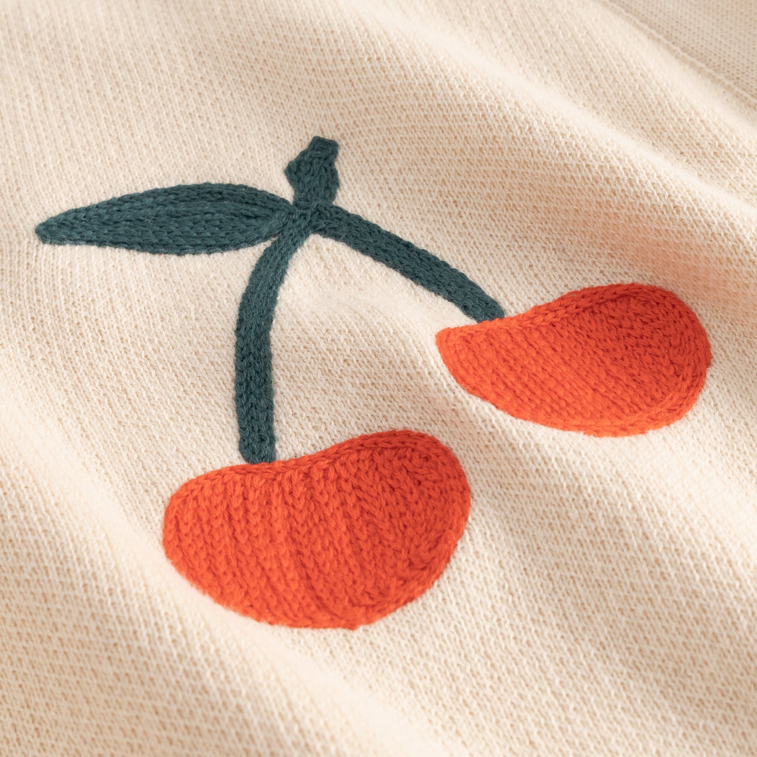 Jacquard-Strickjacke Vanilleweiß – Cardigan aus GOTS-zertifizierter Bio-Baumwolle