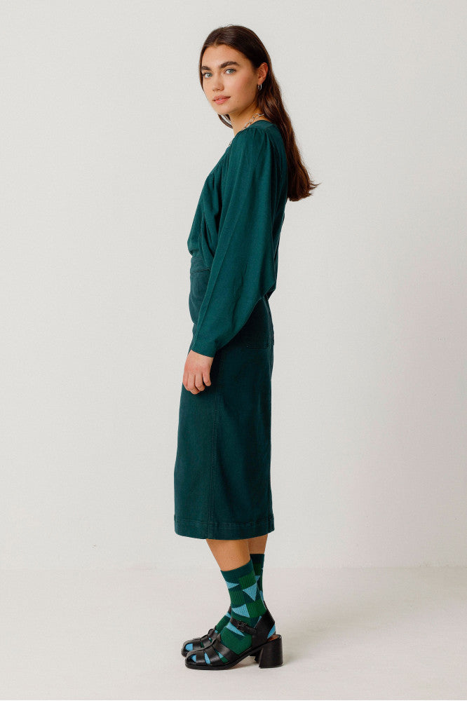 DOTA SKIRT IN DARK GREEN – SCHMALER ROCK IN MIDI-LÄNGE